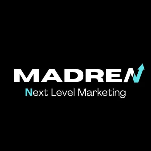 MADREAM Next Level Marketing logo with turquoise upward arrow on black background